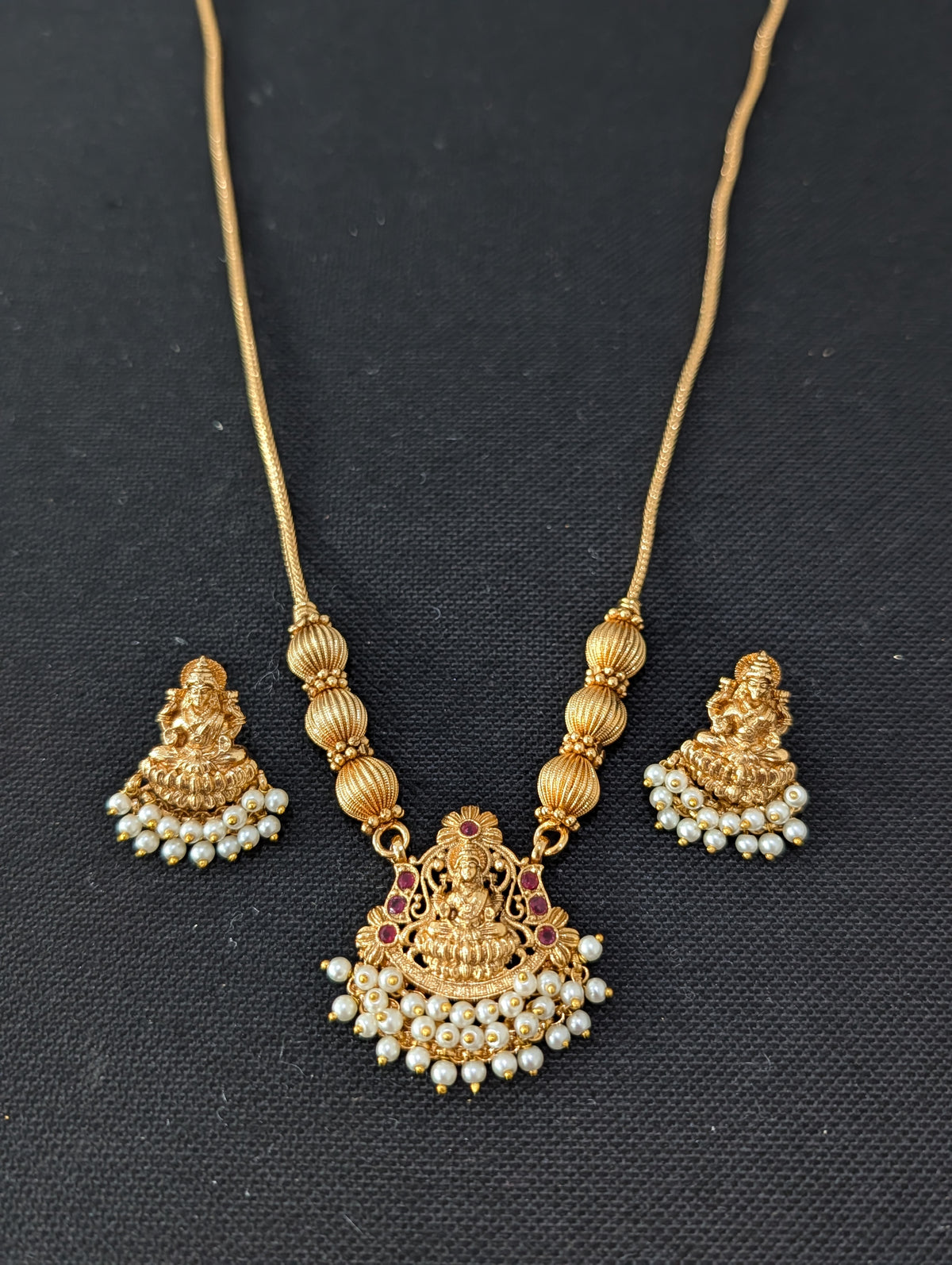 Pearl hand setted Goddess Lakshmi Pendant Chain Stud set