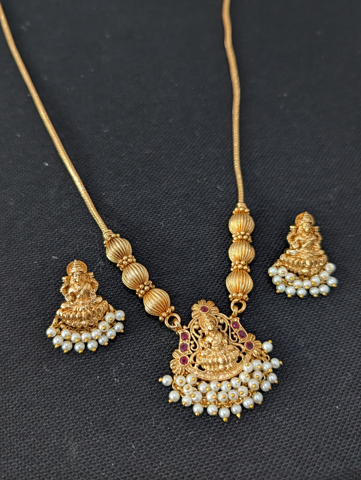 Pearl hand setted Goddess Lakshmi Pendant Chain Stud set