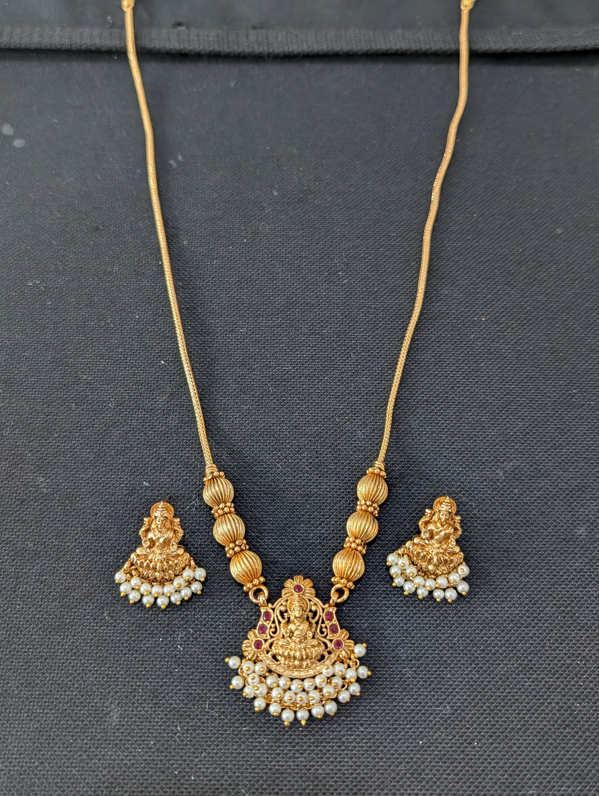 Pearl hand setted Goddess Lakshmi Pendant Chain Stud set