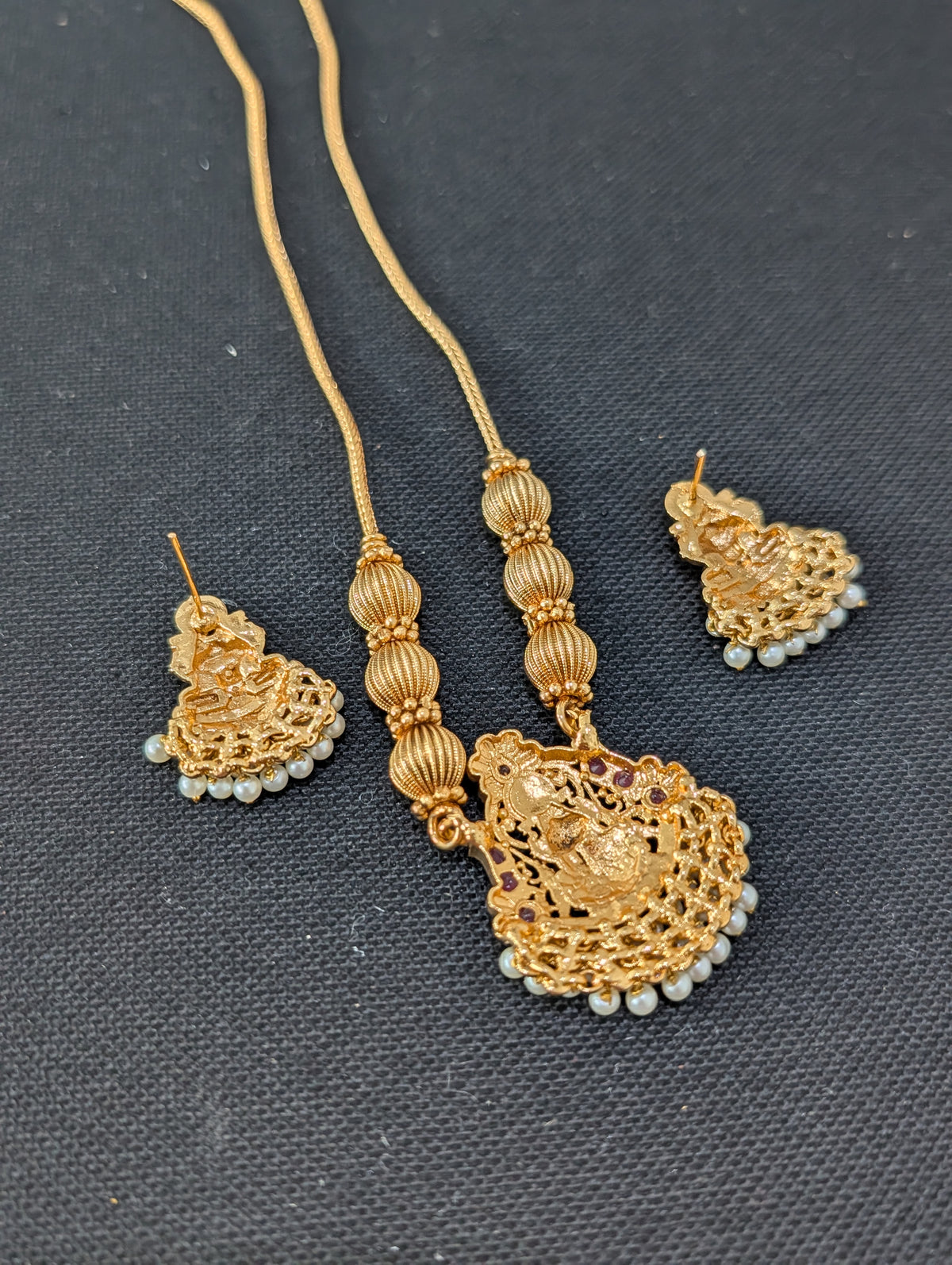 Pearl hand setted Goddess Lakshmi Pendant Chain Stud set