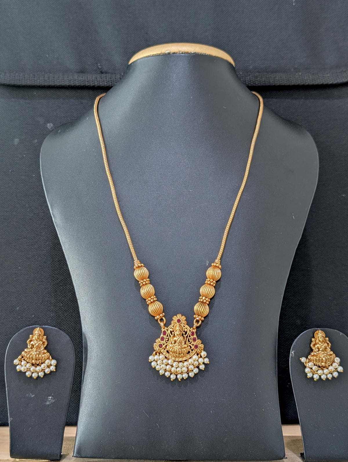 Pearl hand setted Goddess Lakshmi Pendant Chain Stud set