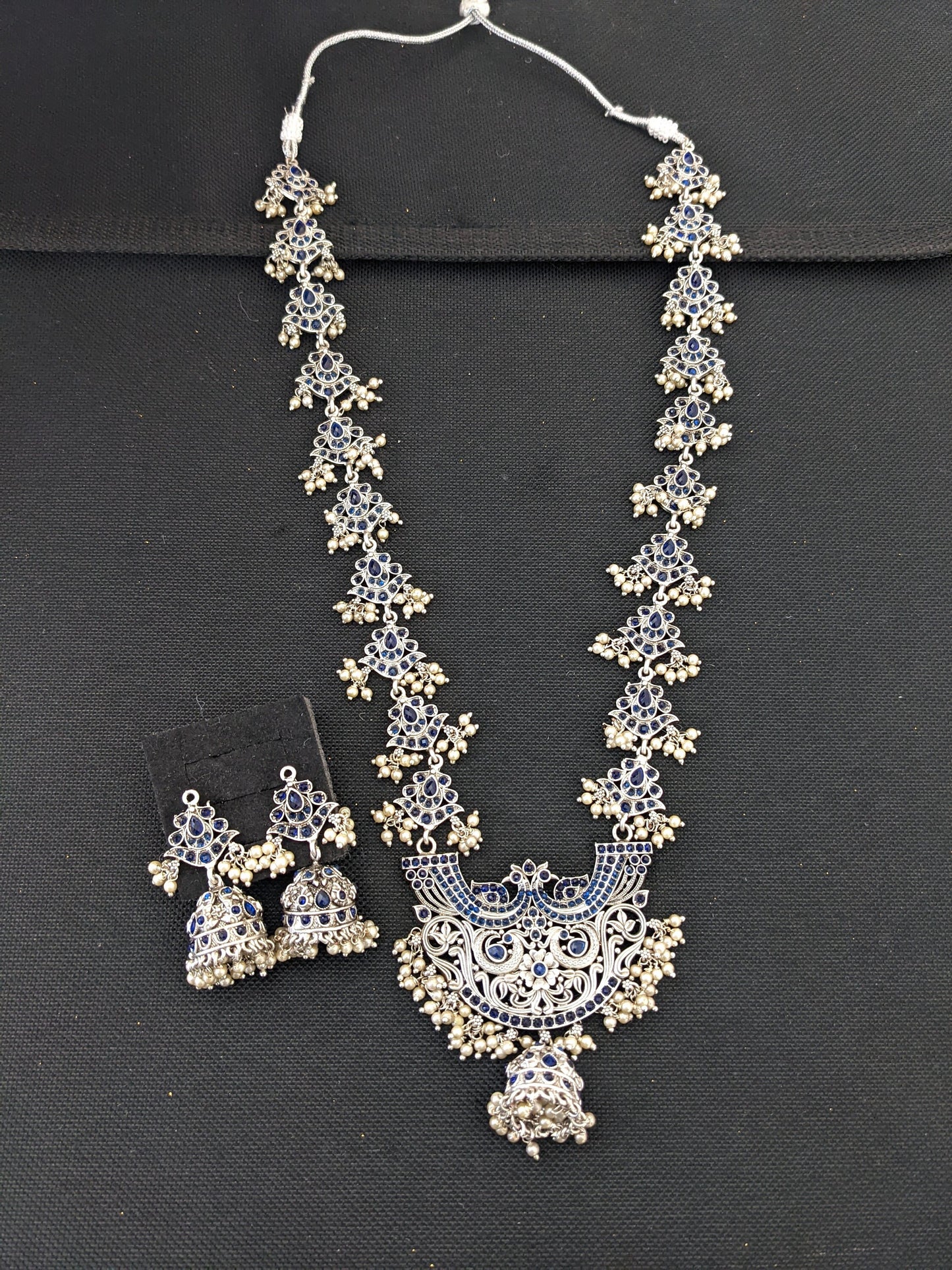 Guttapusalu Silver plated Polki Long necklace and earrings set - Simpliful