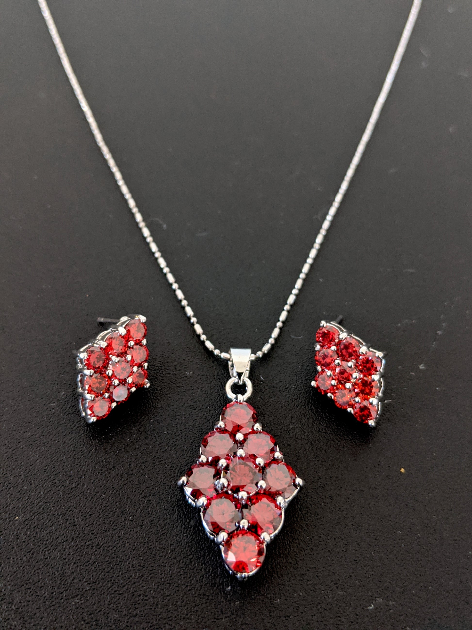 Platinum plated Red CZ stone Diamond Pendant and stud earring set - Simpliful