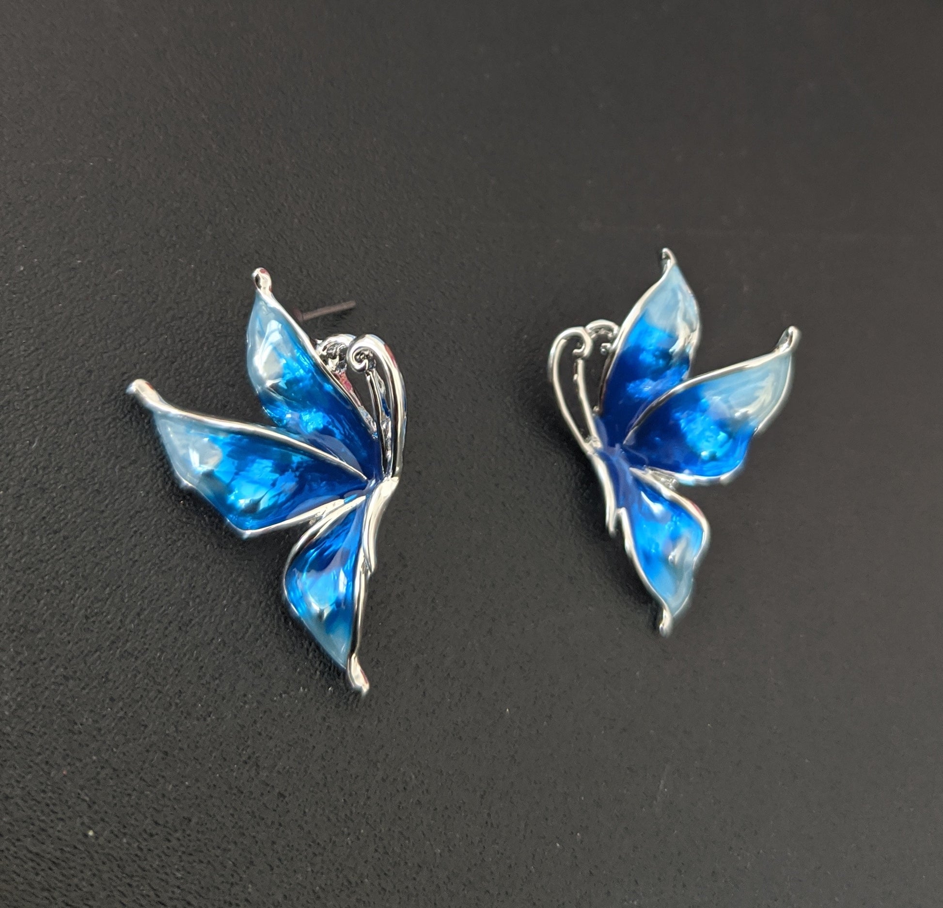 Enamel work platinum finish butterfly stud earring - Simpliful