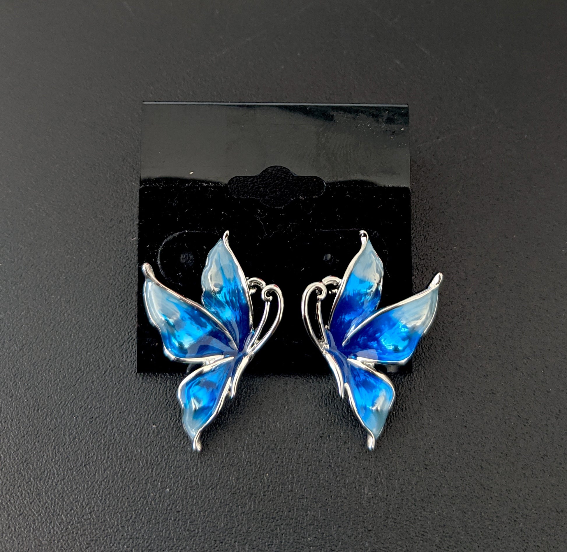 Enamel work platinum finish butterfly stud earring - Simpliful