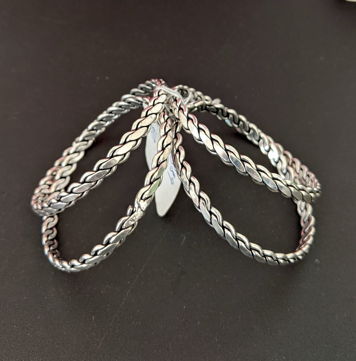 Spiral design oxidized silver bangles - Set of 4