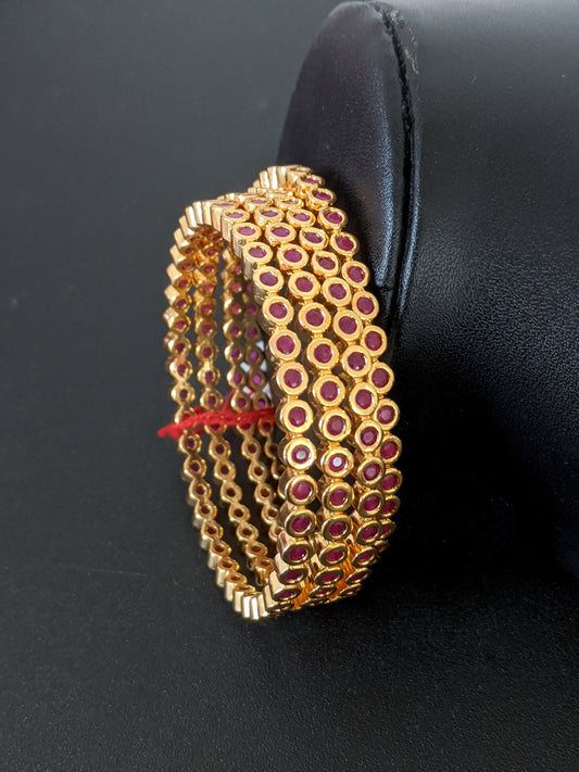 Ruby stones embedded one gram gold polished bangles - Simpliful