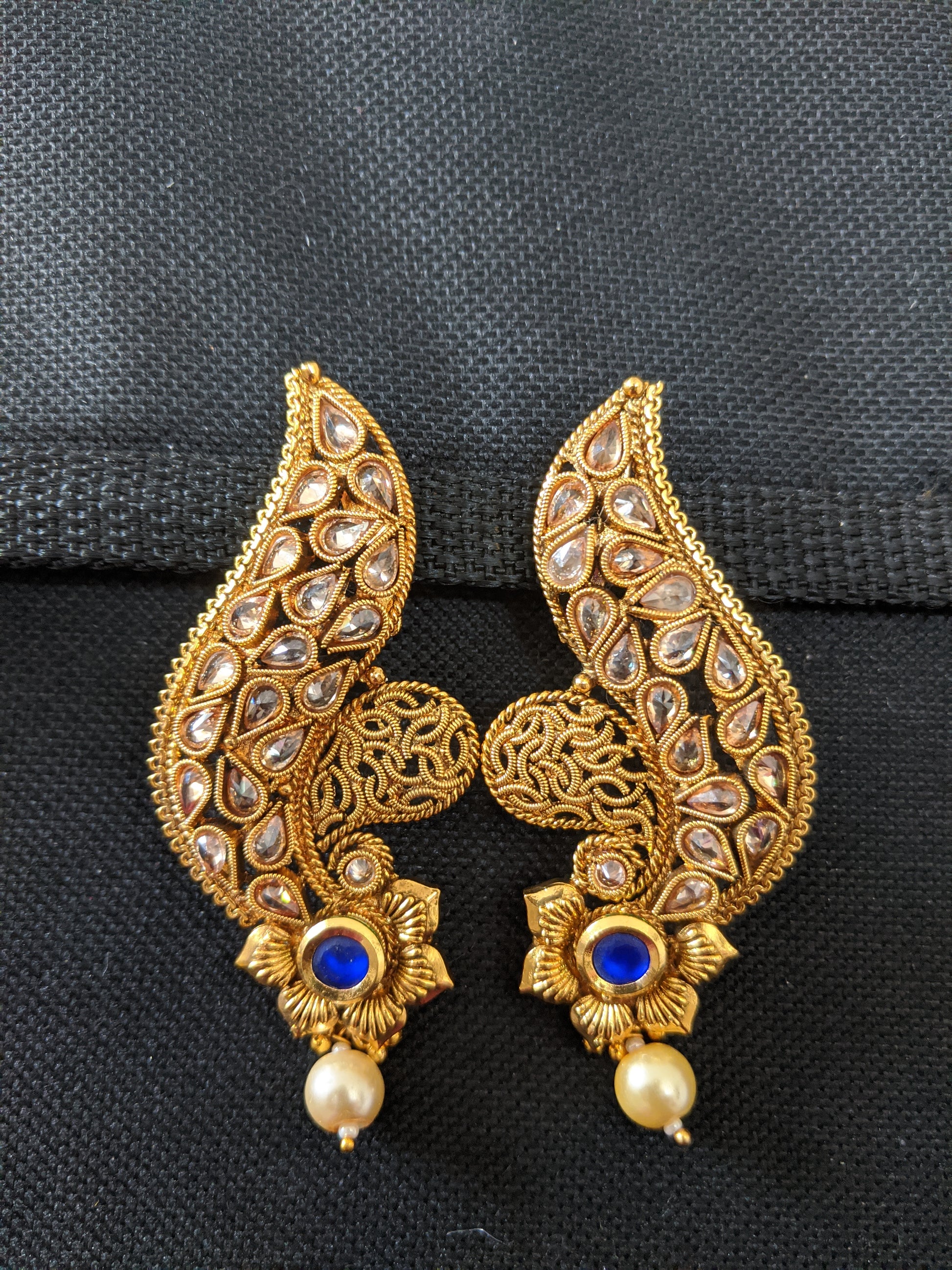 Curvy design polki stone pasted flower long gold imitation earring - Simpliful