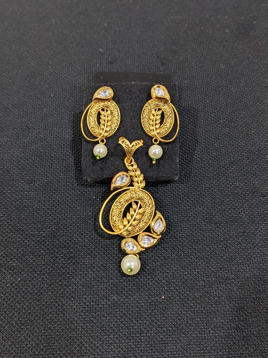 Yellow matte gold Kundan Pendant and Earrings Set - 2 designs