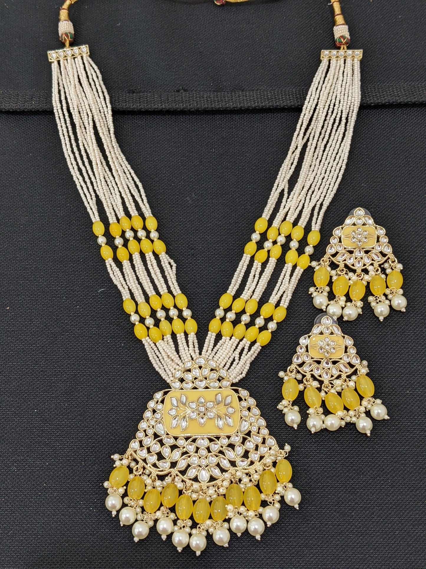 Multi strand Oval bead Necklace Kundan Pendant and Earrings set