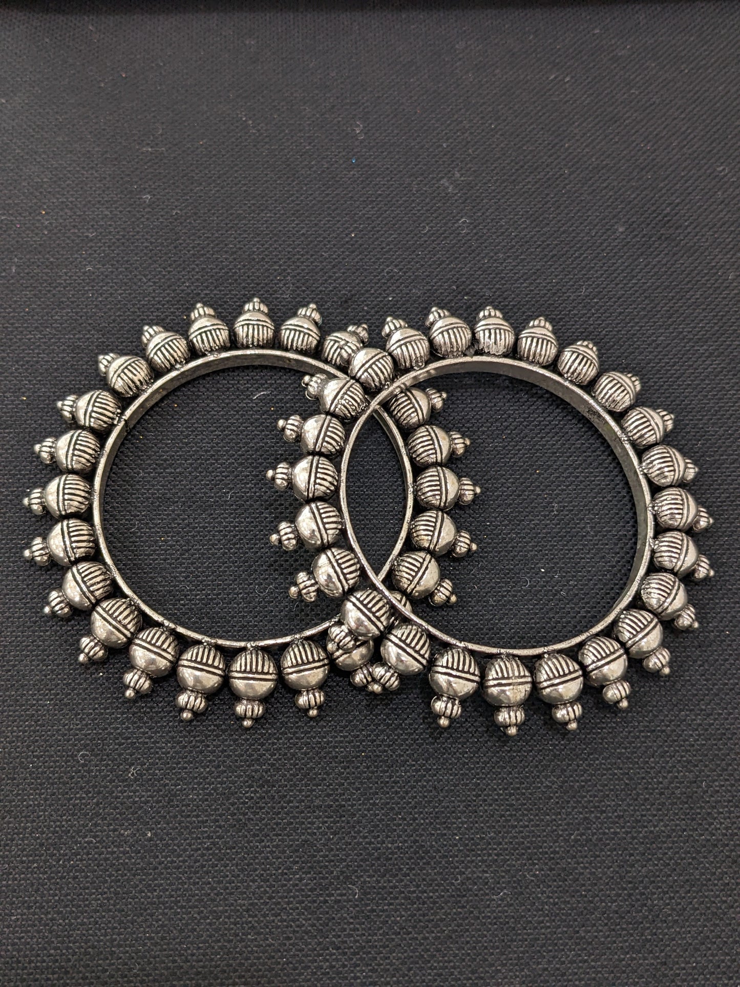 Oxidized silver pair bangles - Lined ball design