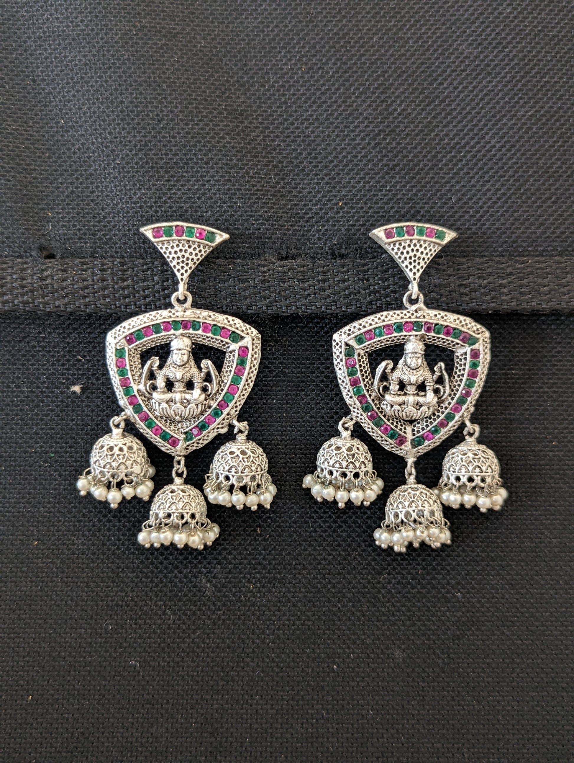 Goddess Lakshmi Triple jhumka bright matte silver earrings - Simpliful