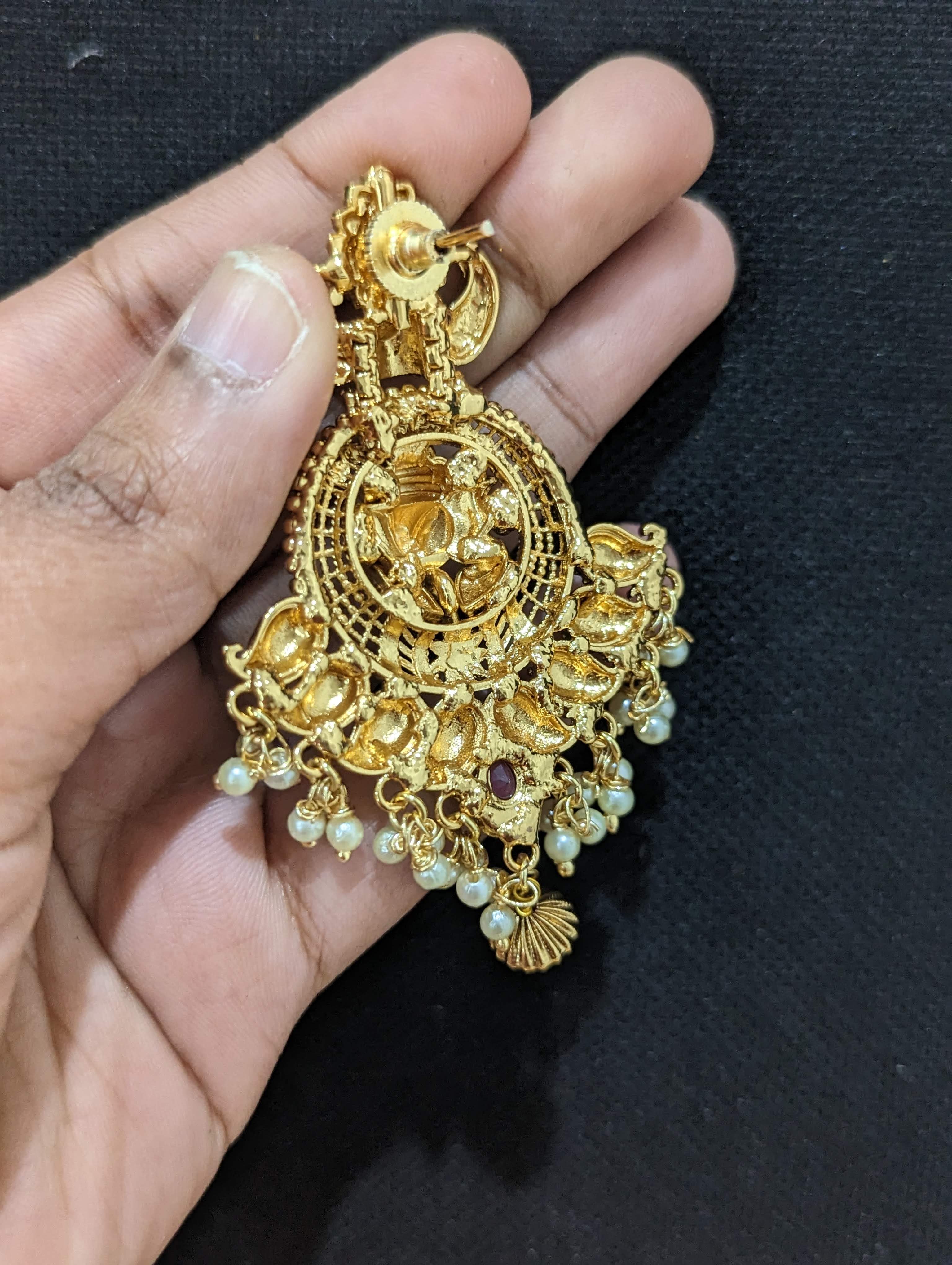 Glow of Swastik Gold Earrings