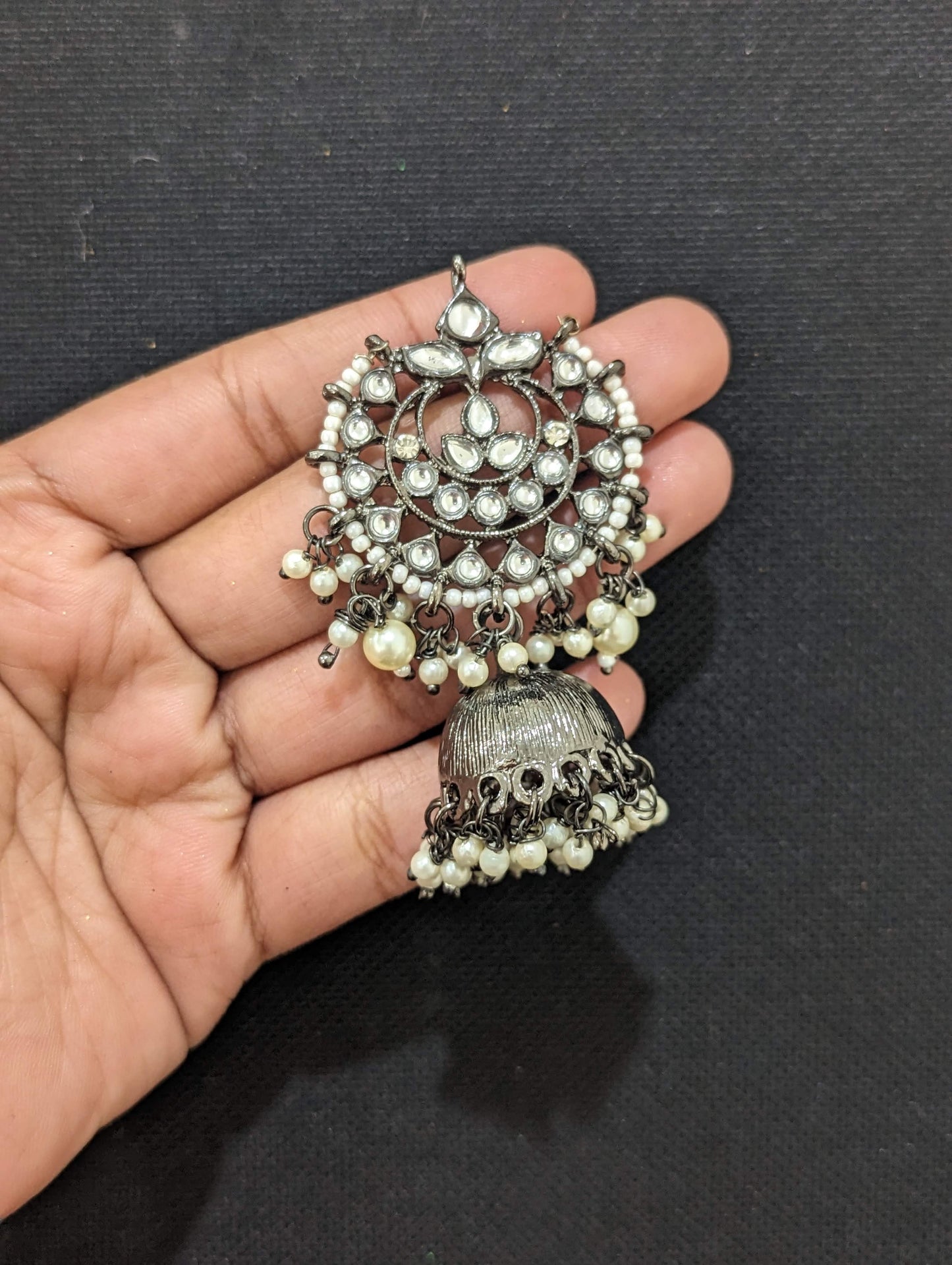 Black plated jhumka earrings