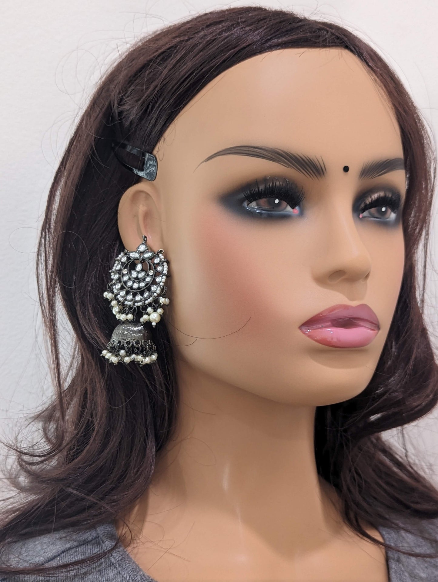 Black plated jhumka earrings