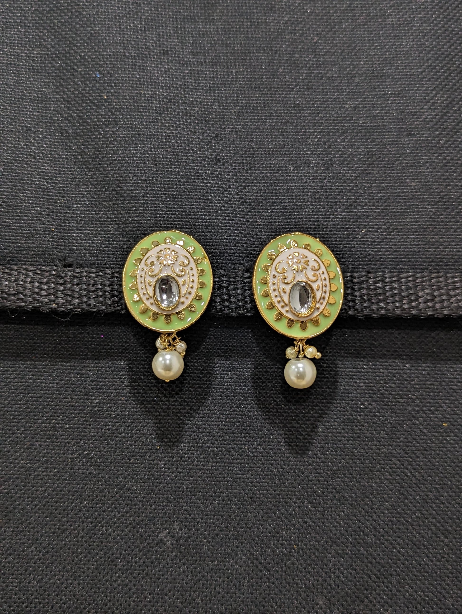 Enamel work oval stud with glass kundan Earrings - Simpliful