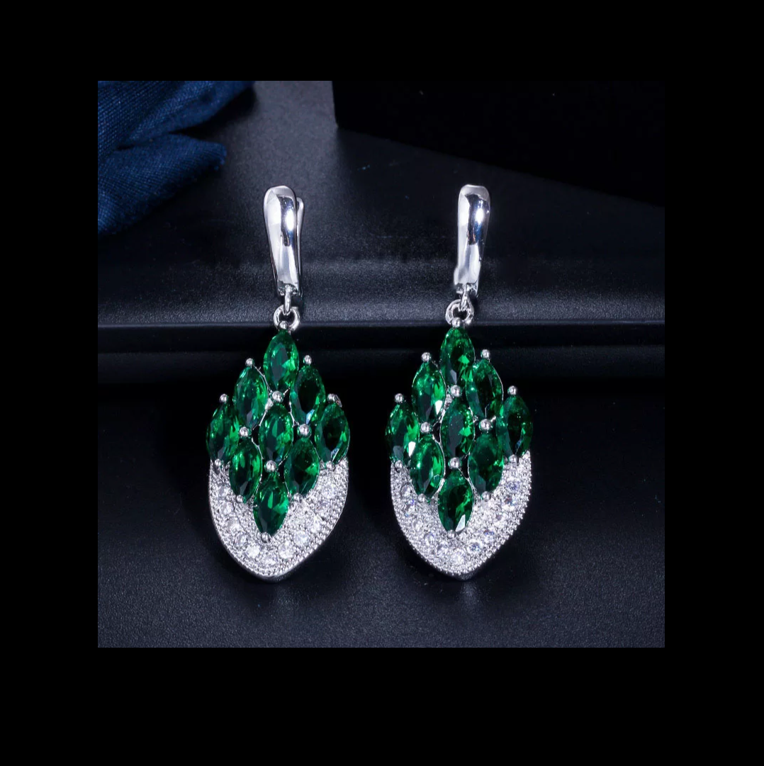 Shiny CZ stone embedded platinum finish curved diamond design earrings - Simpliful