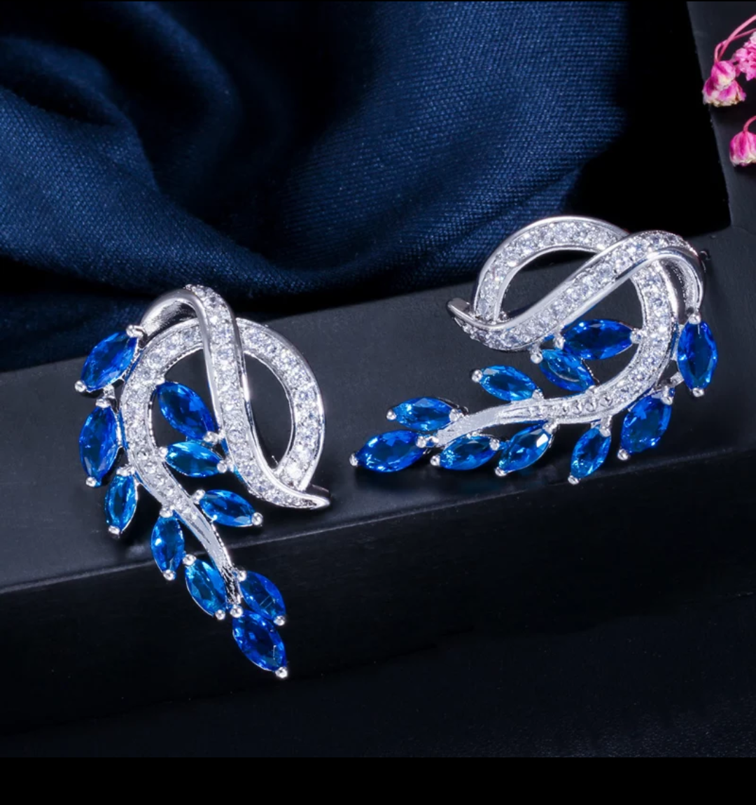 Curved leaf design luxury cz stone platinum finish party wear stud earring - Simpliful