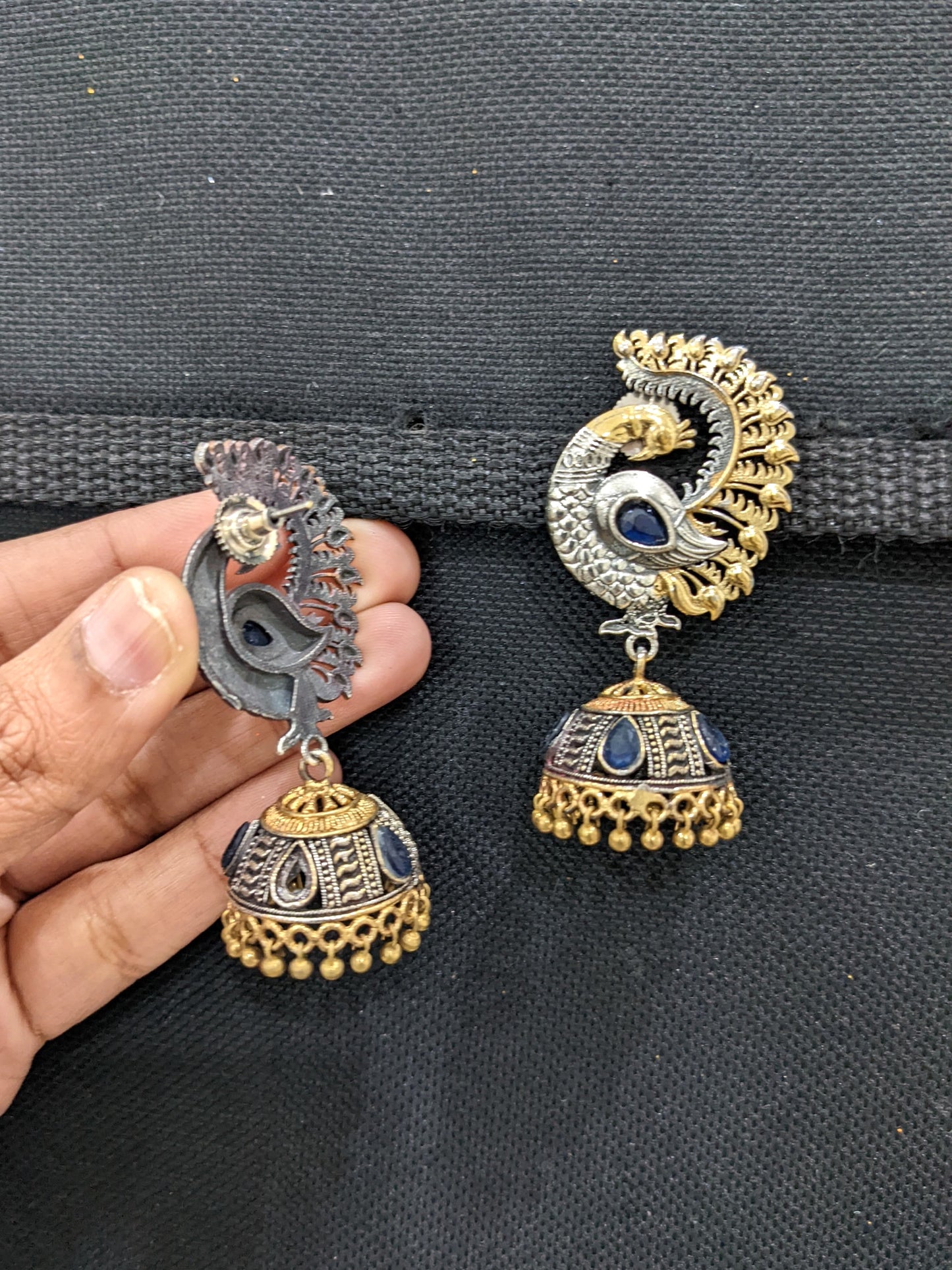 Peacock dual tone oxidized silver jhumka earrings