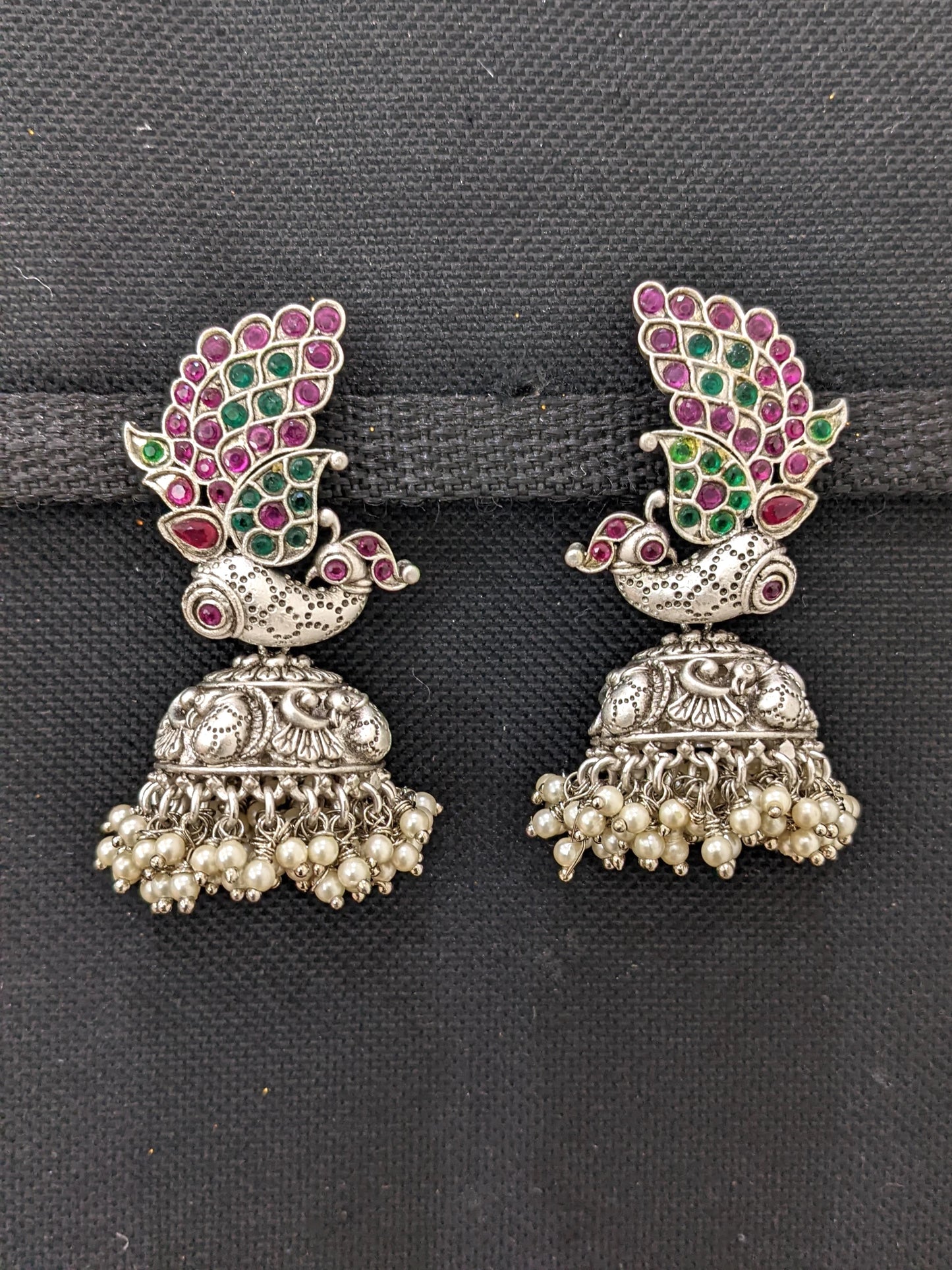 Traditional Peacock design Kemp Rhodium Silver Jhumka earrings