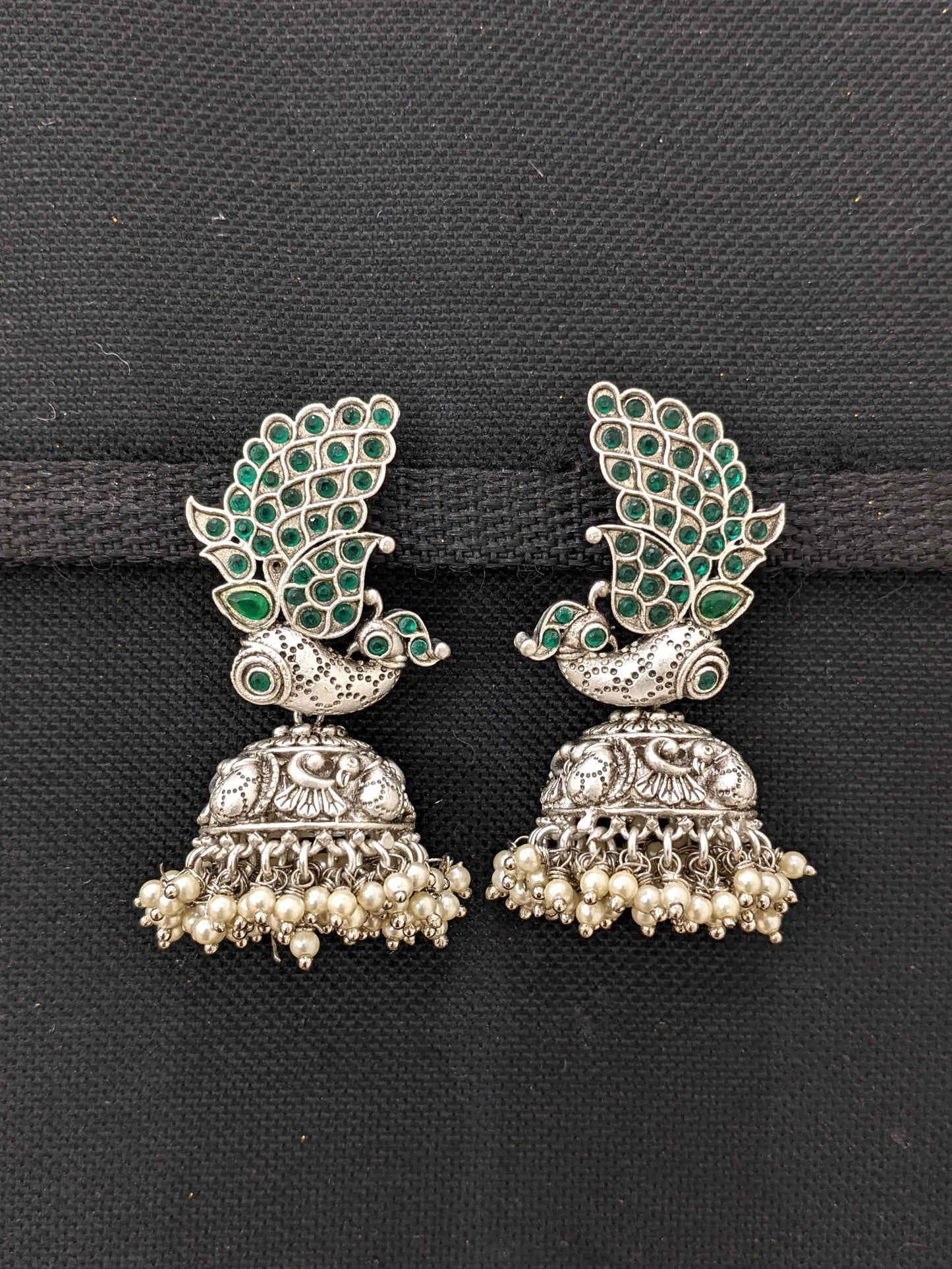 Traditional Peacock design Kemp Rhodium Silver Jhumka earrings