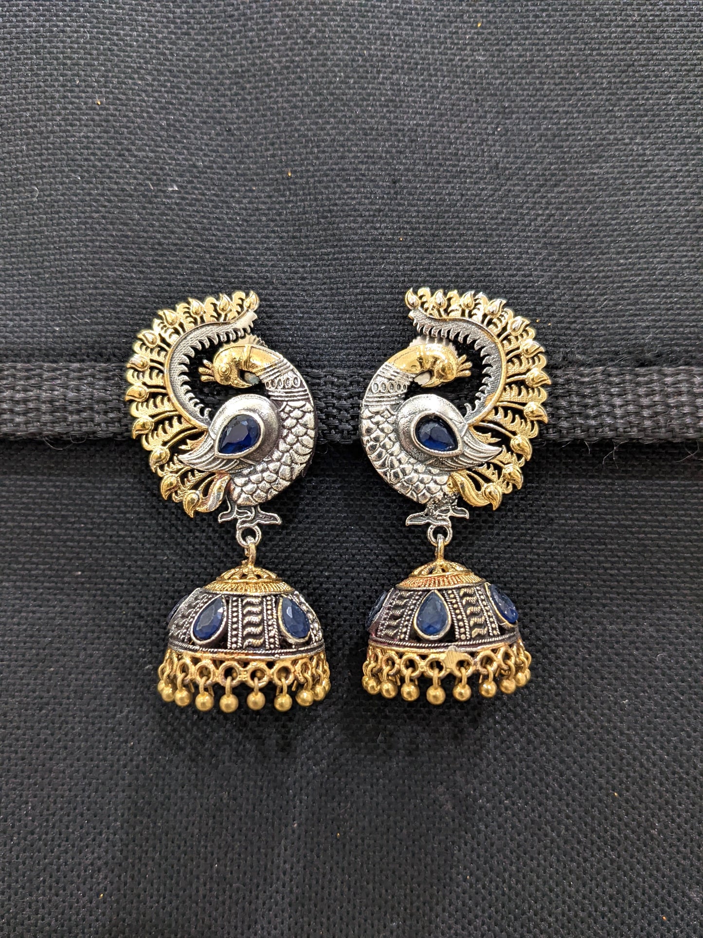 Peacock dual tone oxidized silver jhumka earrings