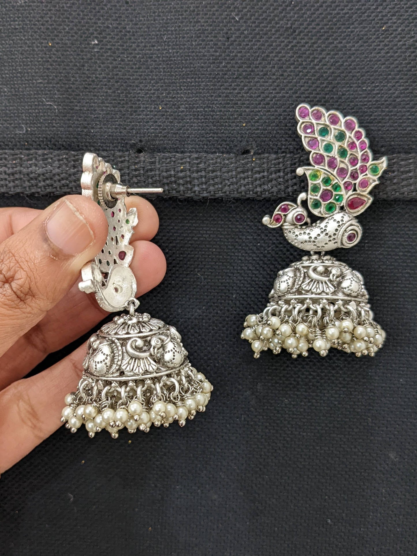 Traditional Peacock design Kemp Rhodium Silver Jhumka earrings