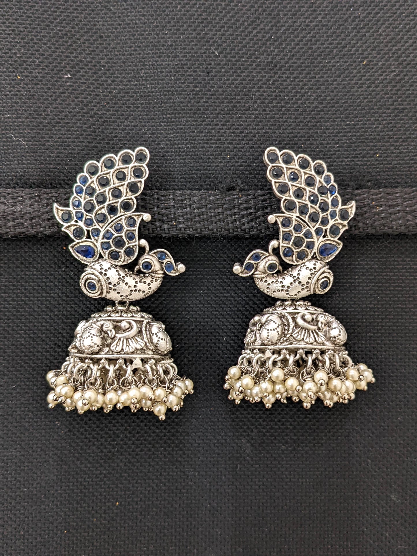 Traditional Peacock design Kemp Rhodium Silver Jhumka earrings